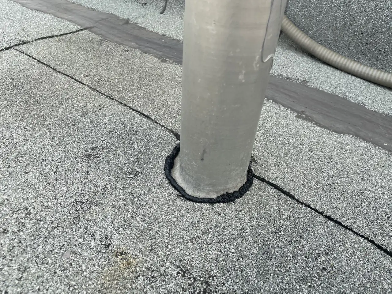 Detailing around a penetration on the membrane