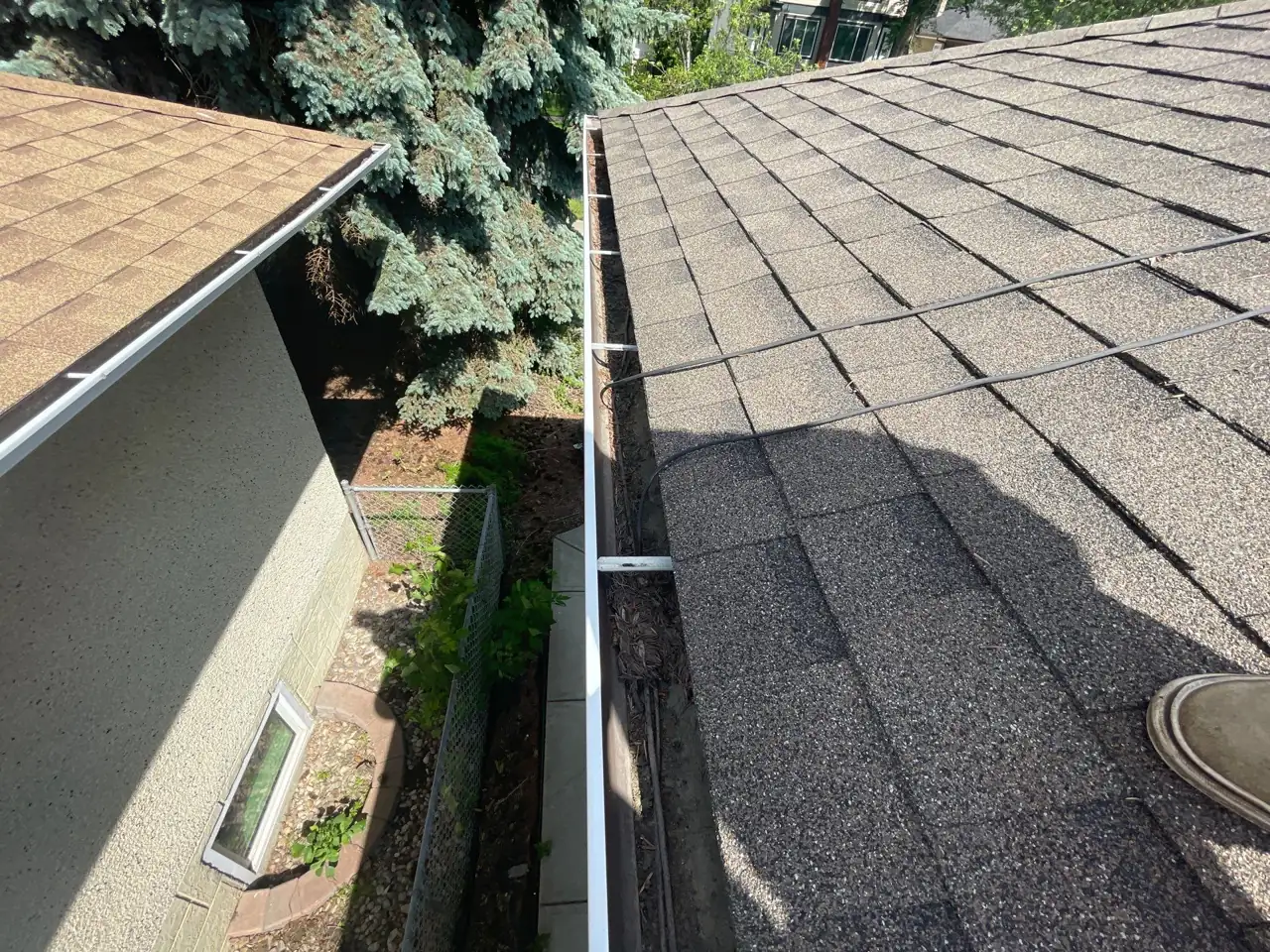 Checking and flushing the downspouts