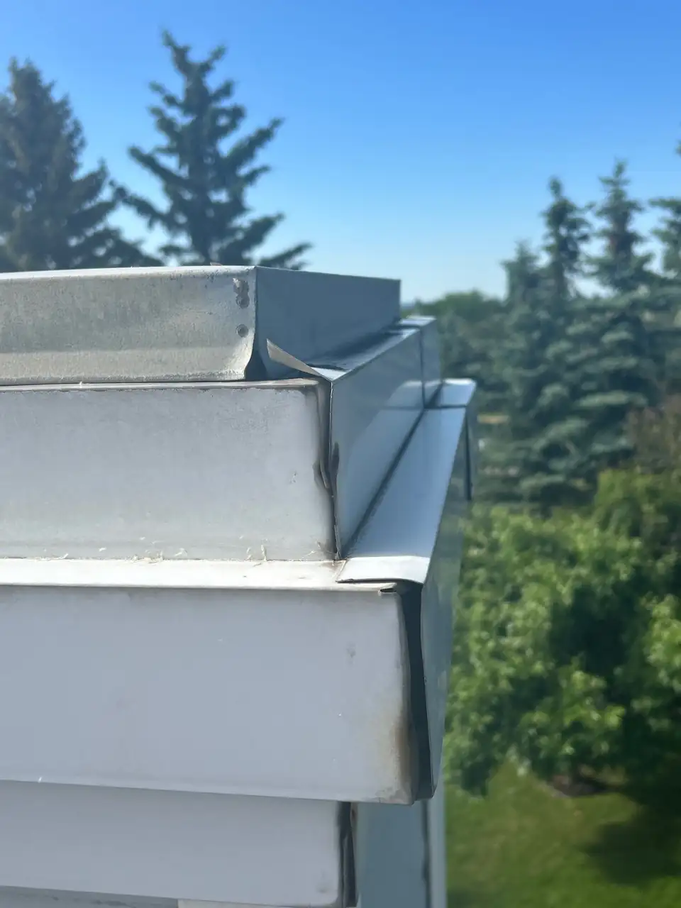 Checking shingle condition across the roof