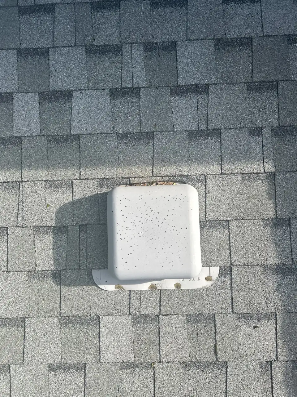 Detailed roof inspection on a Sherwood Park home showing shingles, a skylight, and vents