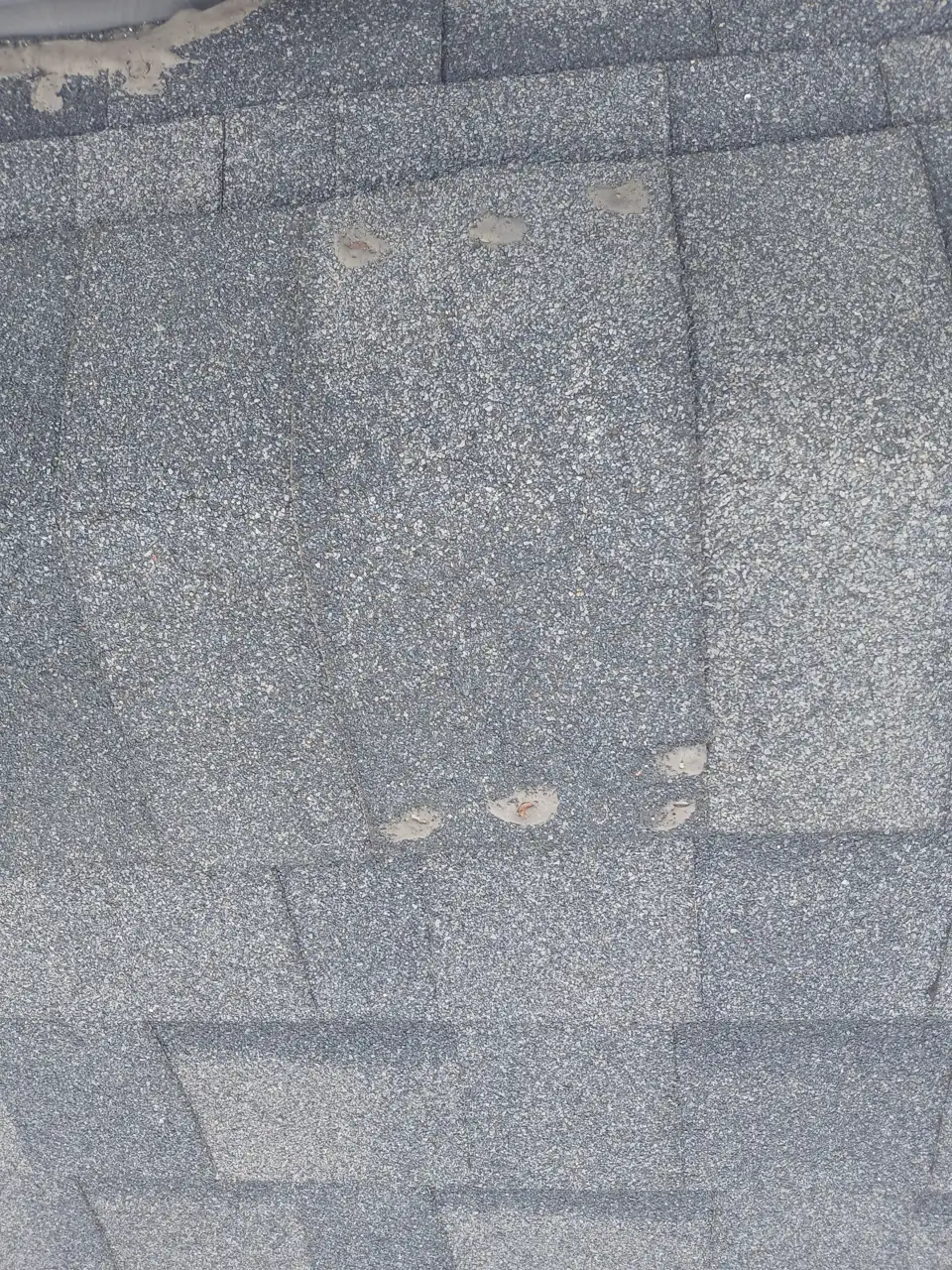 Close inspection of the shingles and roof details