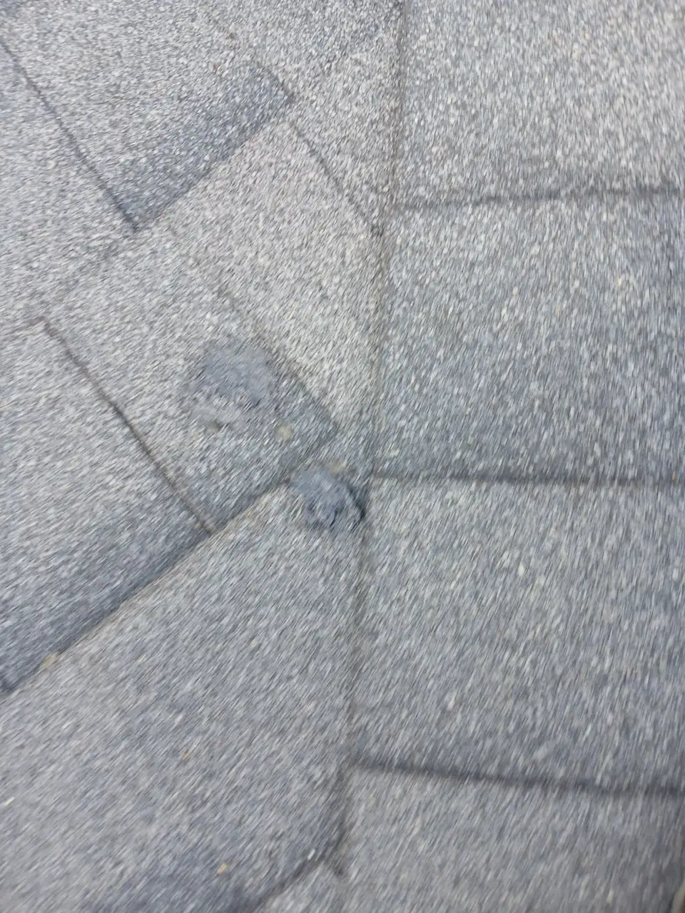 Repaired and sealed section of the shingle roof