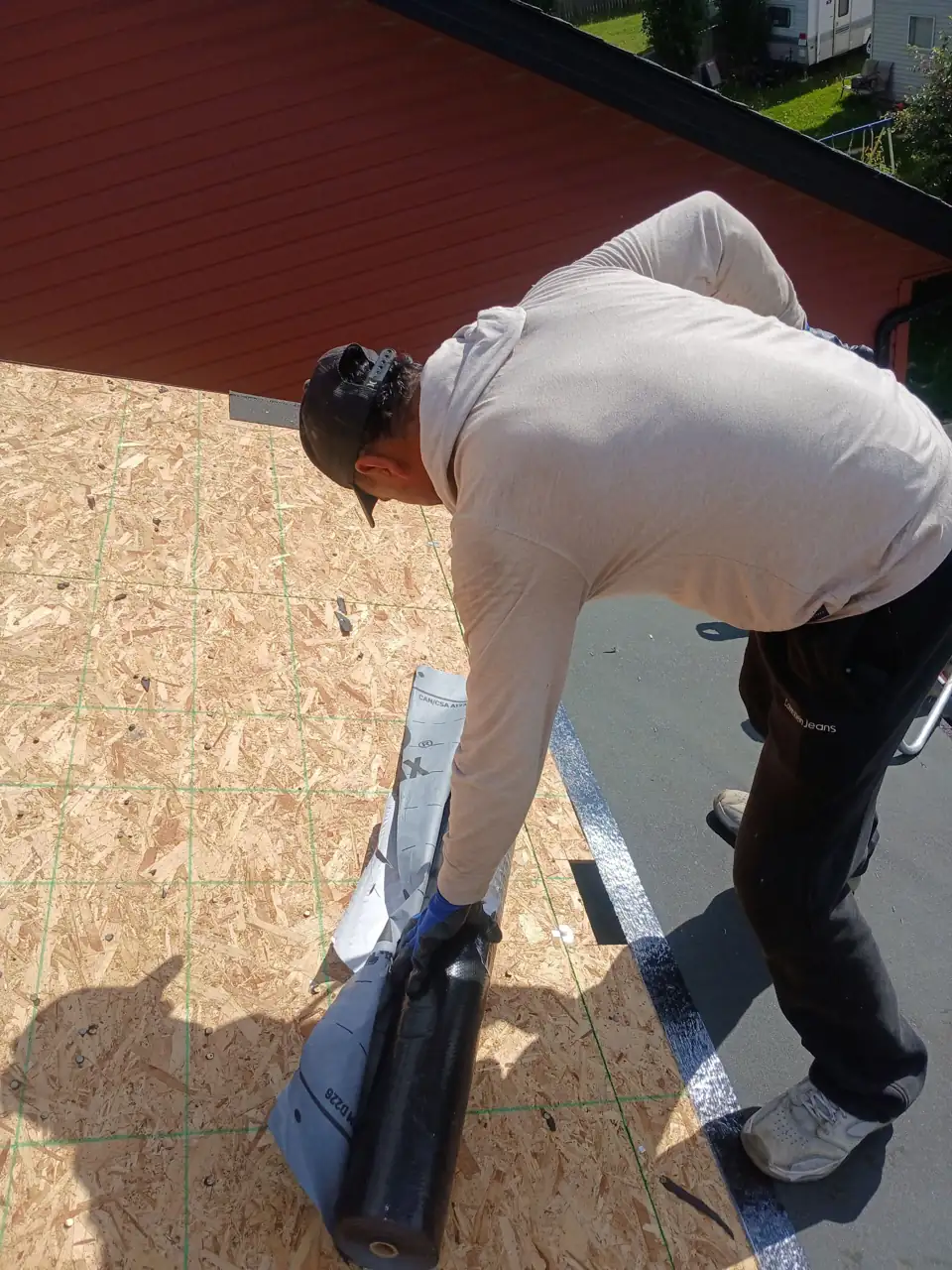 RESISTO synthetic underlayment going down over the deck