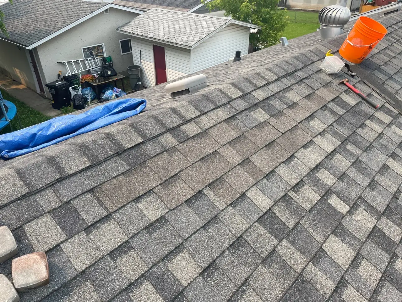 New shingles going on to match the roof