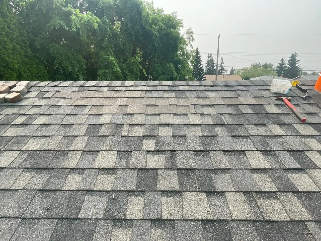 Completed shingle repair, roof closed to the weather